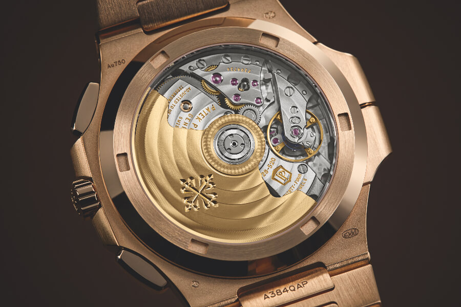 Patek Philippe Ref. 5990/1R-001 Nautilus Travel Time Chronograph Watch In House Movement